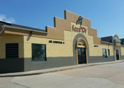 Laundry Land EIFS Repairs & New Paint